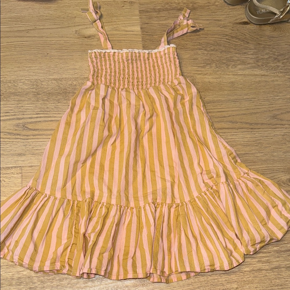 Pink and tan smocked dress from Paris